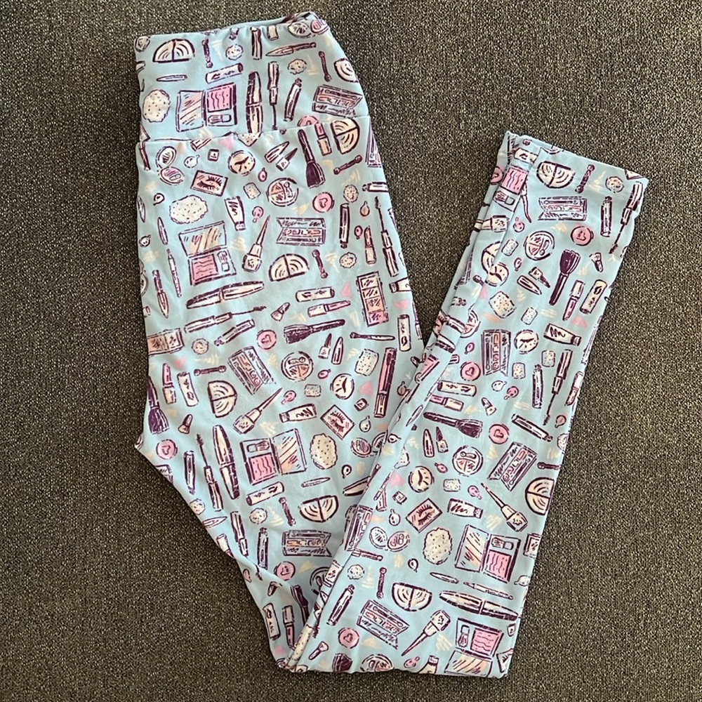 LuLaRoe Women’s  Make Up Perfume Print Leggings. One size.
